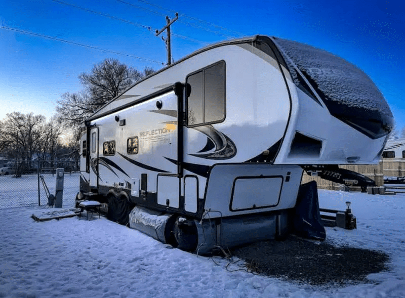 RV in cold snowy weather with airksirts underbelly insulation